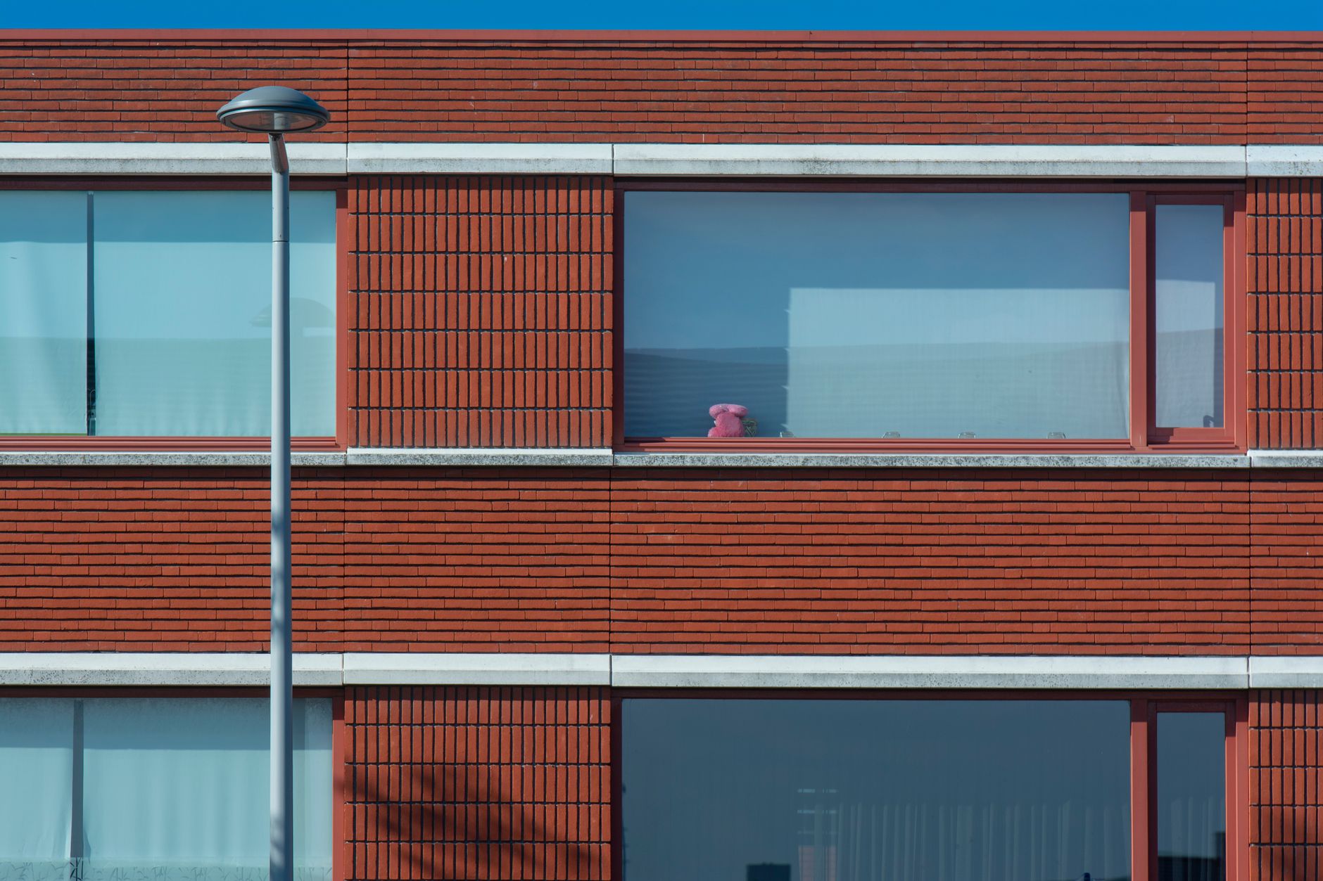 Gevel van een huurappartementencomplex, illustratief voor de fiscale behandeling van box 3 vastgoed